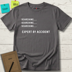 Searching....... Expert by Accident T-Shirt