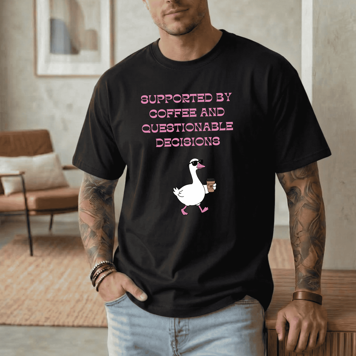 SUPPORTED BY COFFEE AND QUESTIONABLE DECISIONS T-SHIRT